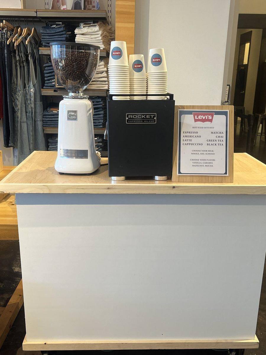 Custom coffee cart branding, cups & menus — 58 Hester 58 Hester custom-branded coffee cart with Levi's cups and menu at a retail brand activation