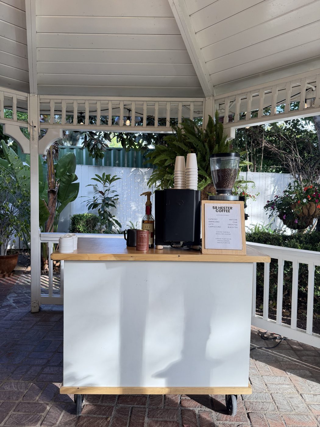 Wedding coffee & beverage cart catering — 58 Hester 58 Hester coffee cart set up under a garden gazebo at a Southern California wedding